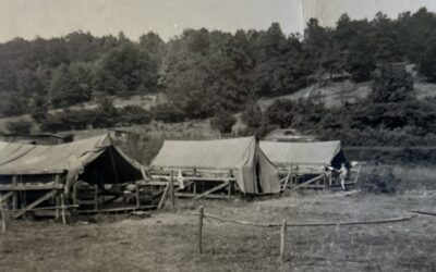 Monochrome image of tent campsite at Camp Gorton, circa 1950 taken by John Sherburne