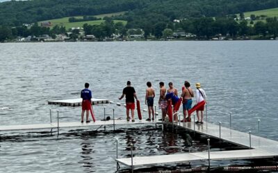 Scout campers on the waterfront docks in Waneta Lake at Camp Gorton